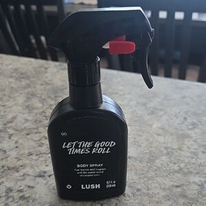 Lush Black Body Spray with Red Trigger